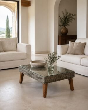 Tavolino basso in rattan con piano in vetro